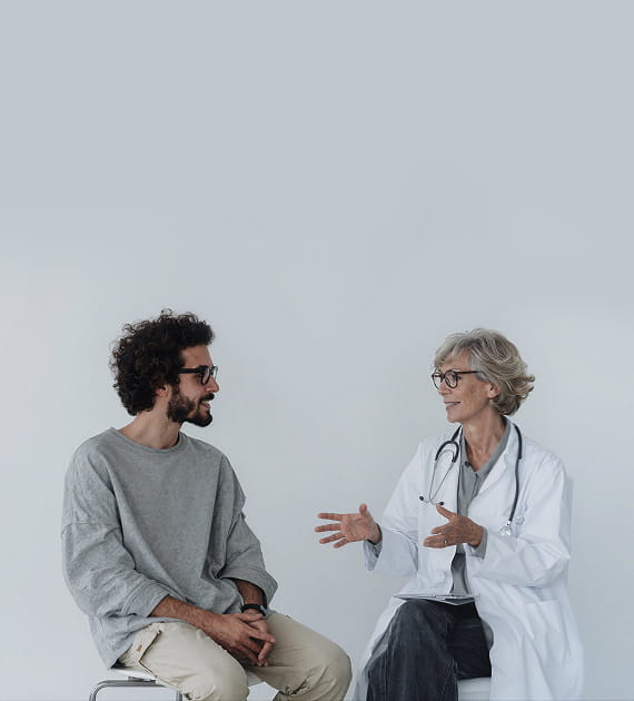 A doctor talking to a patient