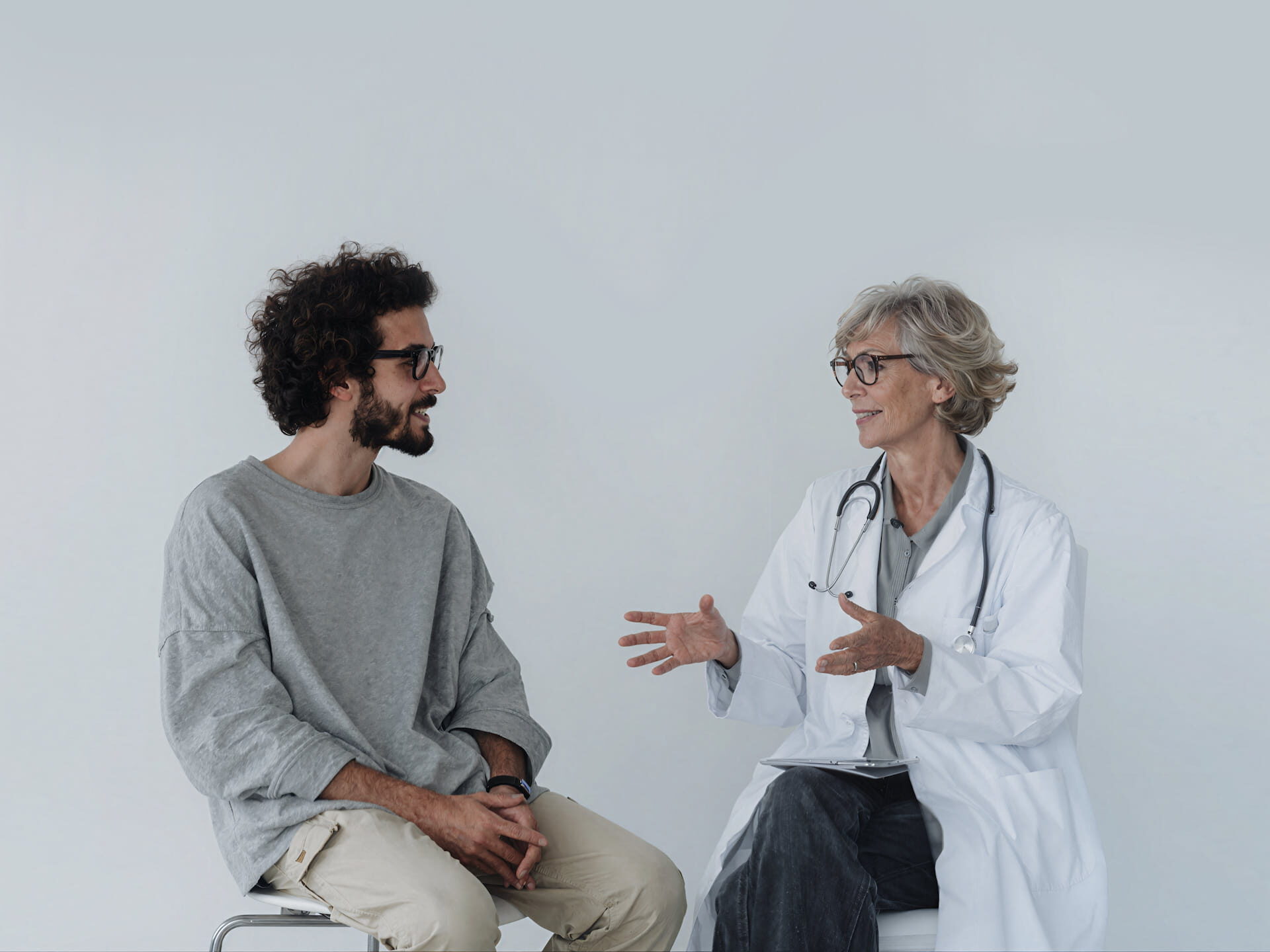 A doctor consulting with a client